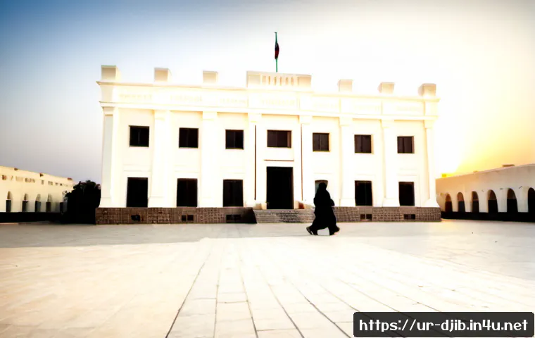 지부티의 주요 법적 시스템 - Photorealistic wide-angle view of Djibouti City courthouse architecture at sunrise, a dignified mode...